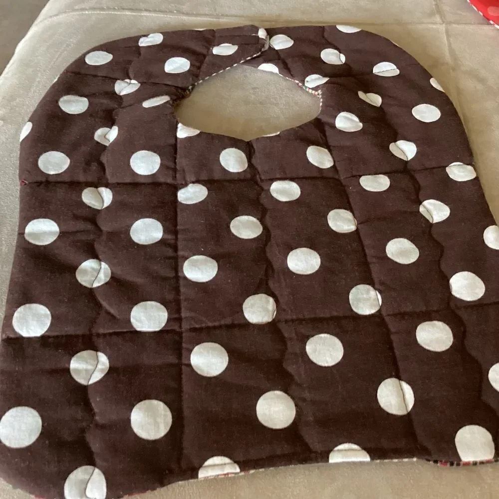 NWT handcrafted, quilted reversible bib in brown green red fabrics